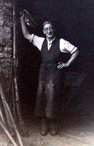 Leonard Herbert at the smithy from the Biddenham Women's Institute scrapbook [X535/6]